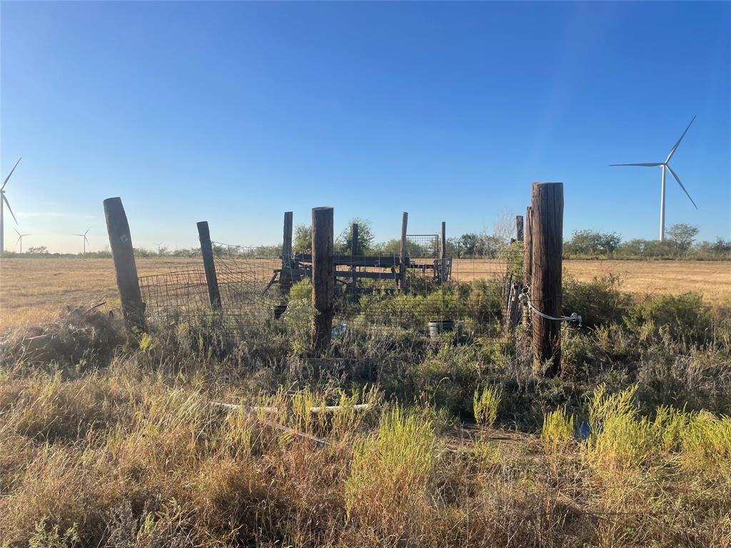 345 County Road 3346 Hubbard, TX 76648 - Photo 14 of 16 a view of a lake with a tree in the background