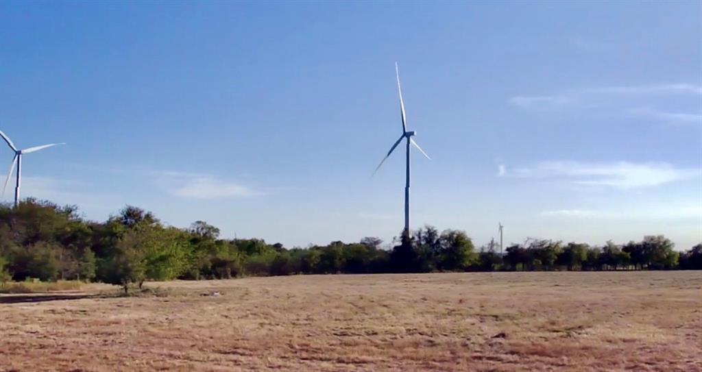 345 County Road 3346 Hubbard, TX 76648 - Photo 5 of 16 a view of a field with a tree in the background