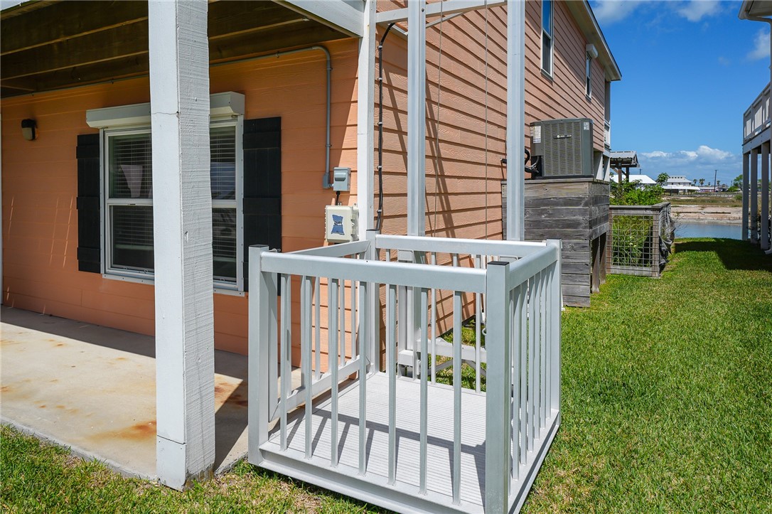 838 Rattlesnake Point Road Rockport, TX 78382 - Photo 4 of 40 a view of a house with backyard and porch