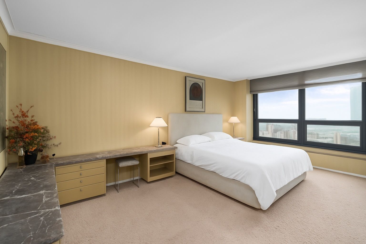 1030 North State Street, Unit 51EF Chicago, IL 60610 - Photo 11 of 20 a bed room with a bed and a night stand