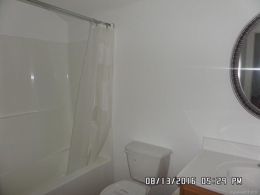 159 Pine Street Rutherfordton, NC 28139 - Photo 17 of 23 a bathroom with a toilet and a shower