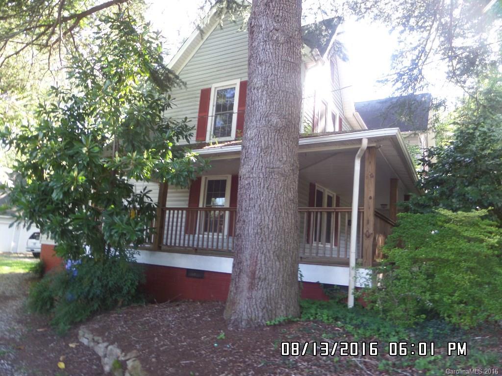 159 Pine Street Rutherfordton, NC 28139 - Photo 3 of 23 a front view of a house with a garden