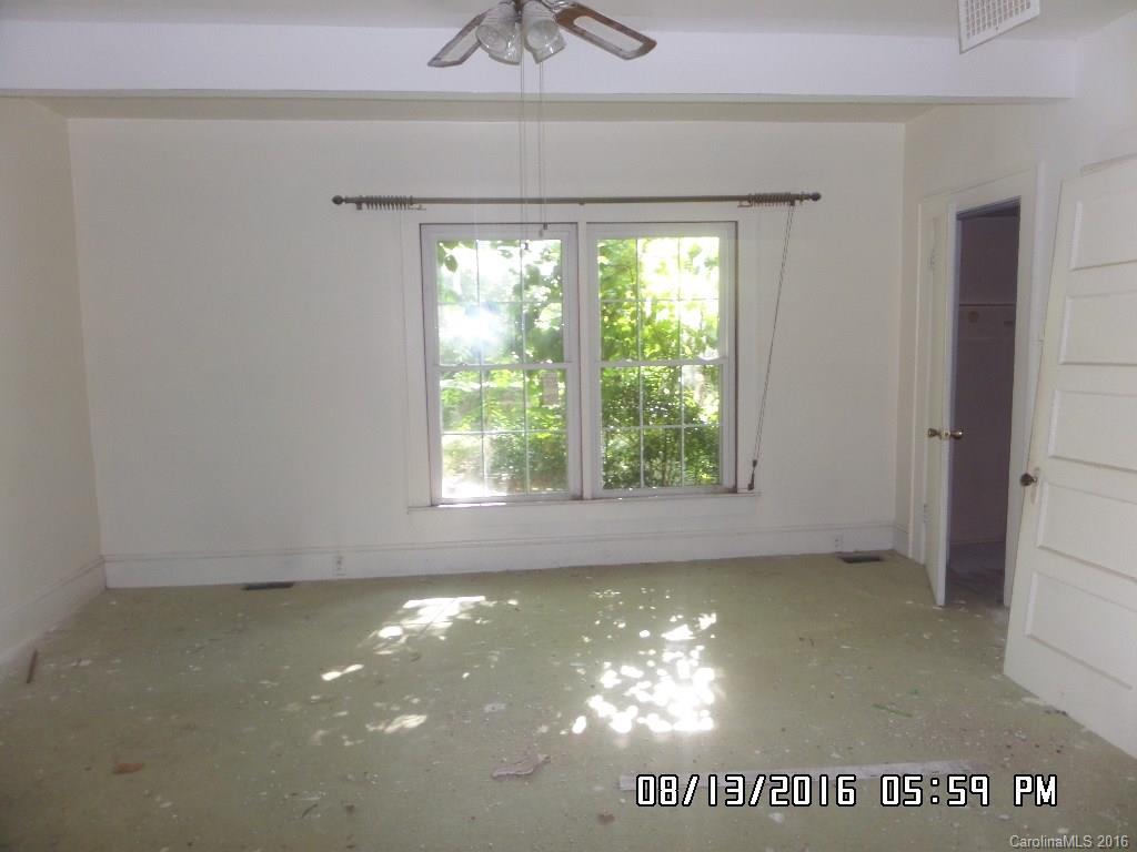 159 Pine Street Rutherfordton, NC 28139 - Photo 21 of 23 an empty room with a window