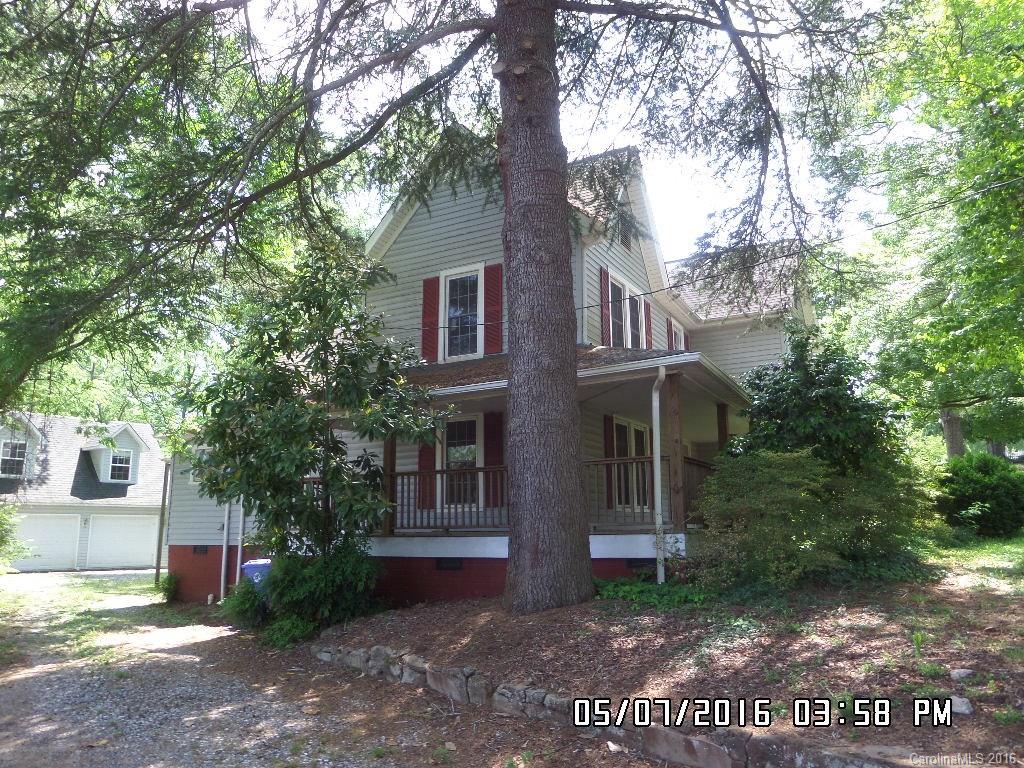159 Pine Street Rutherfordton, NC 28139 - Photo 4 of 23 front view of a house with a trees