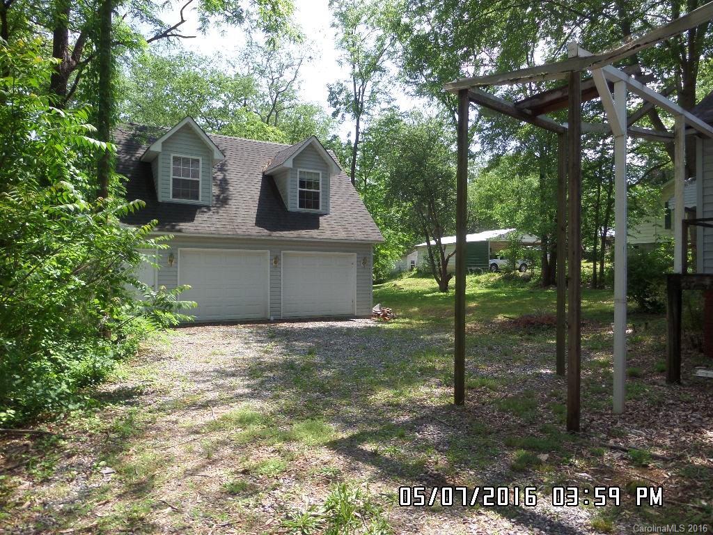 159 Pine Street Rutherfordton, NC 28139 - Photo 6 of 23 a front view of a house with a yard