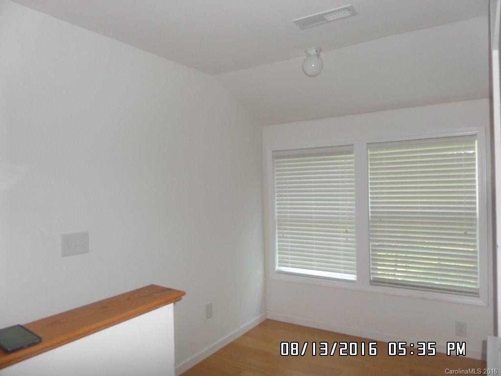 159 Pine Street Rutherfordton, NC 28139 - Photo 9 of 23 a view of an empty room with a window