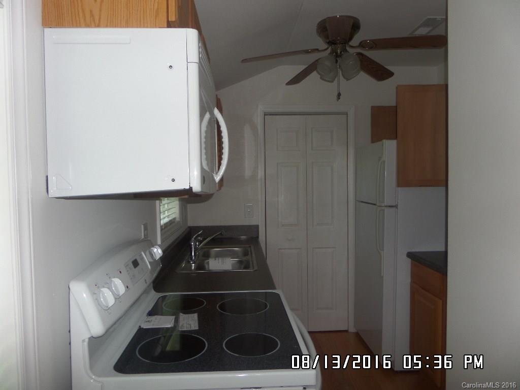 159 Pine Street Rutherfordton, NC 28139 - Photo 10 of 23 a room with storage and utility