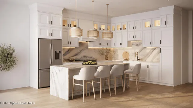 a large kitchen with a table and chairs