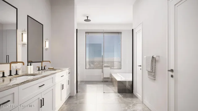 a spacious bathroom with a double vanity sink a toilet and a shower