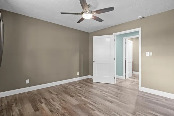 a house with trees in the background