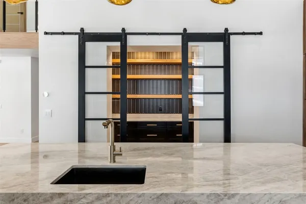 a view of a living room and entryway