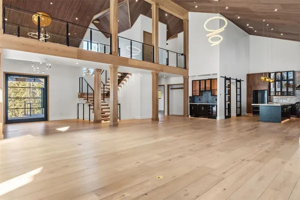 a view of livingroom with a kitchen