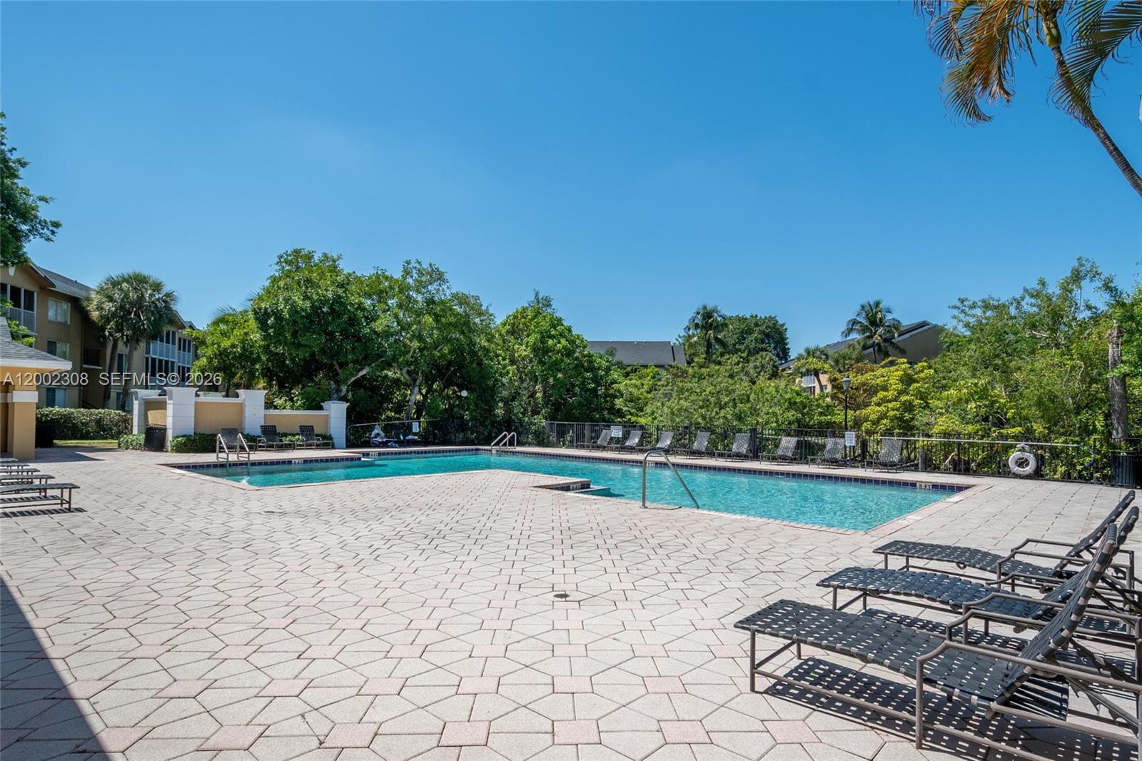 4025 West McNab Road, Unit E109 Pompano Beach, FL 33069 - Photo 26 of 27 a view of a backyard