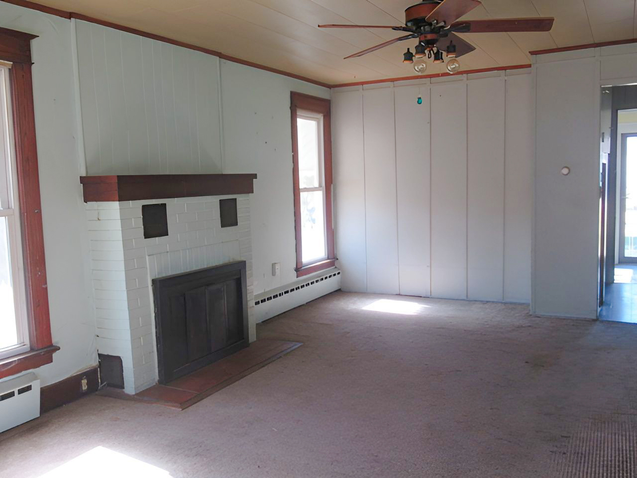 504 South Seminary Street Georgetown, IL 61846 - Photo 20 of 28 a view of empty room with a fireplace