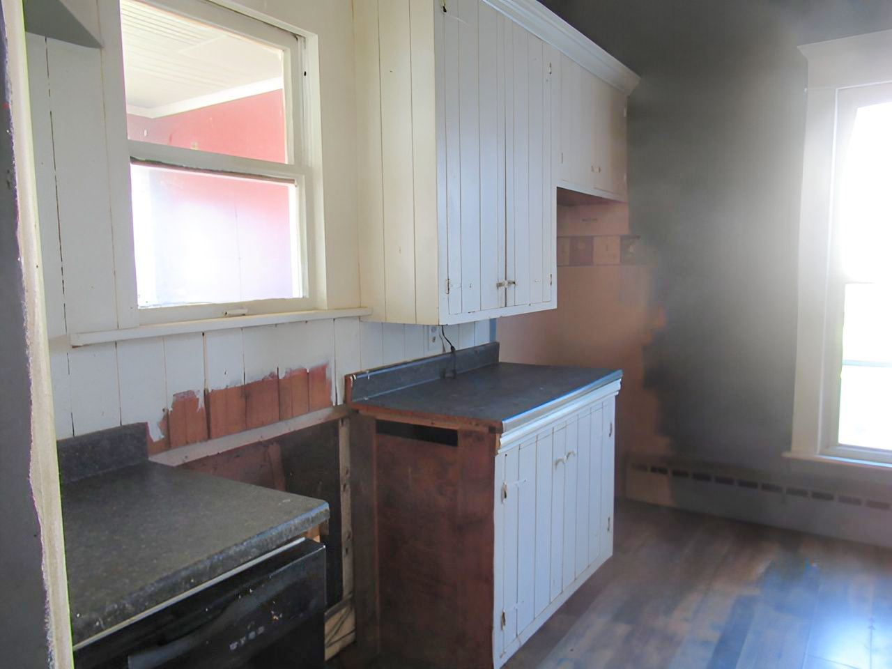 504 South Seminary Street Georgetown, IL 61846 - Photo 23 of 28 a kitchen with a sink cabinets and window
