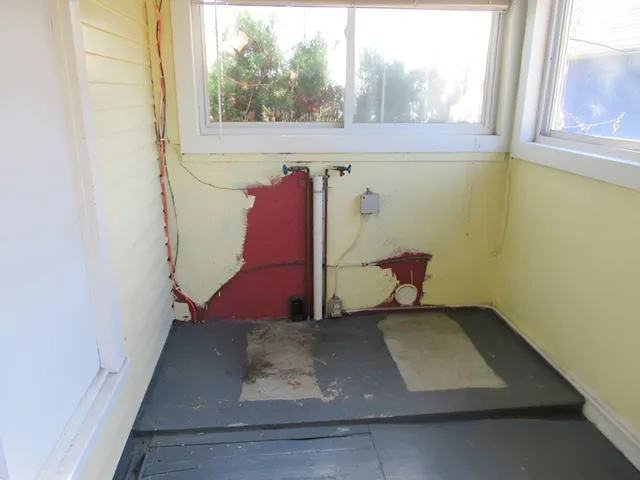 a house with trees in front of it