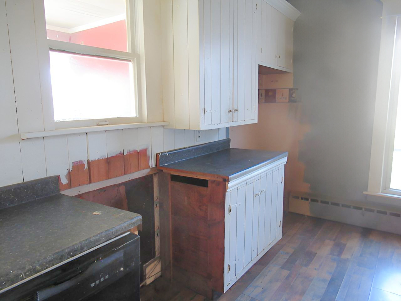 504 South Seminary Street Georgetown, IL 61846 - Photo 5 of 28 a kitchen with a sink cabinets and window