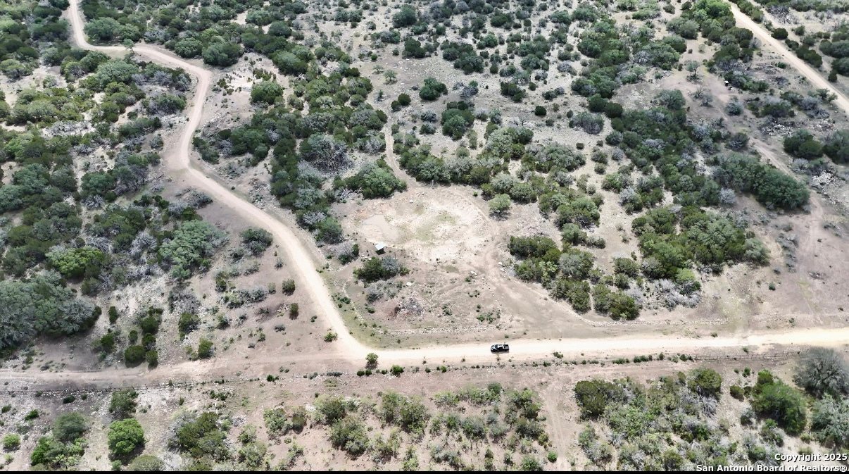 74200 Sd Sonora, TX 76950 - Photo 18 of 19 a view of a dry yard with trees and bushes