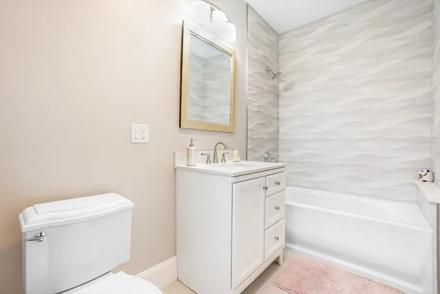 a room with a sink and a window