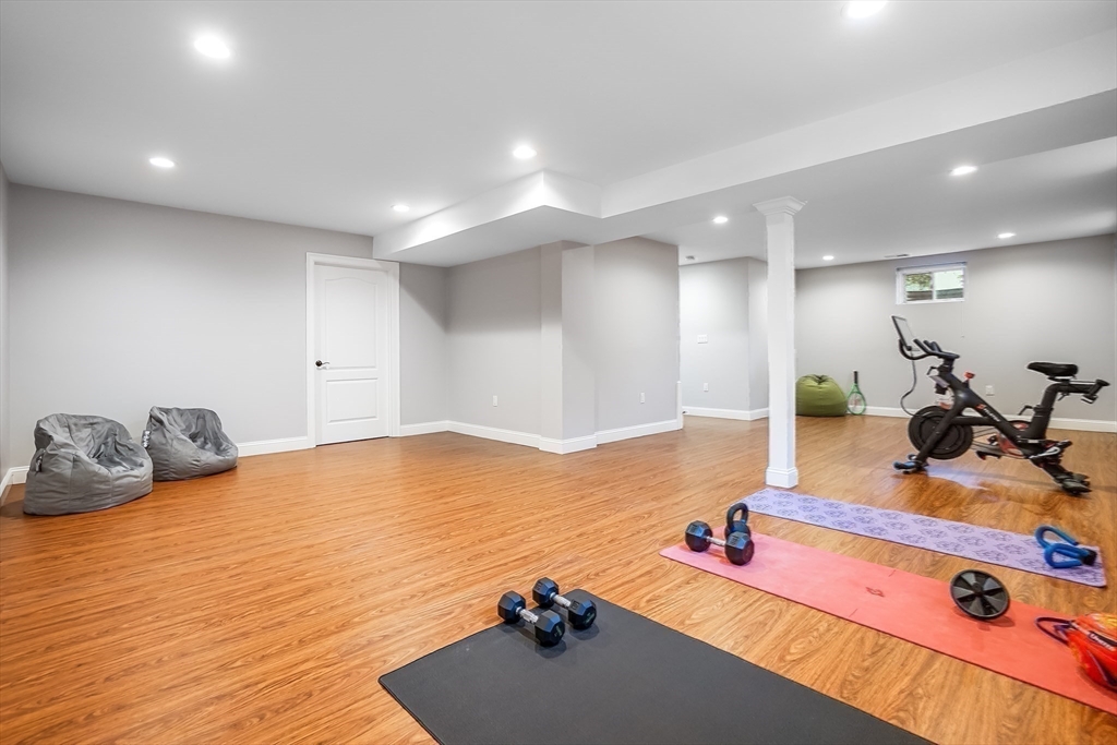 57 Walnut Street Newton, MA 02460 - Photo 34 of 42 a room with furniture and wooden floor