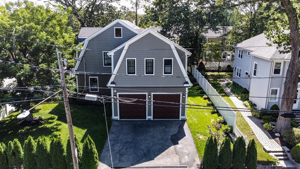 57 Walnut Street Newton, MA 02460 - Photo 38 of 42 a aerial view of a house with swimming pool