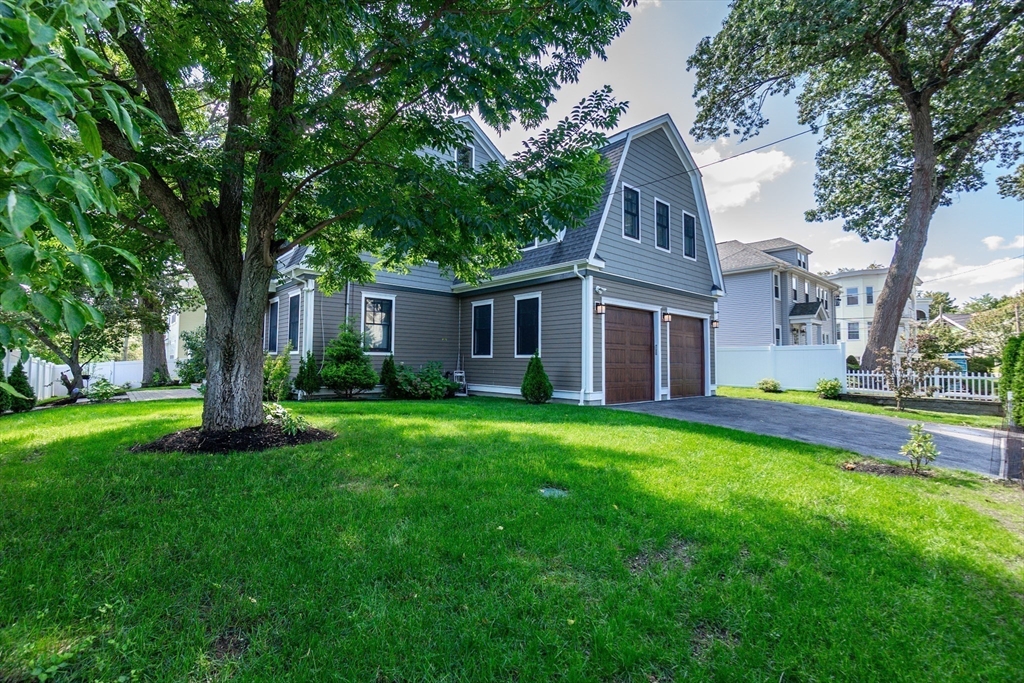 57 Walnut Street Newton, MA 02460 - Photo 6 of 42 front view of a house with a yard