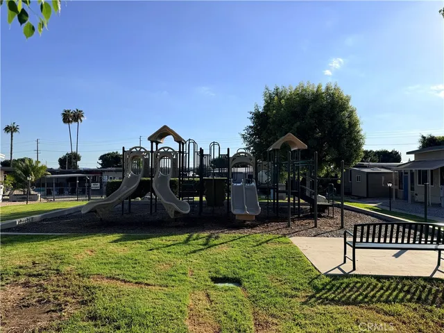 a view of a park with swings