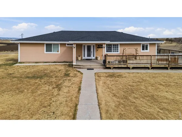a house view with a garden space