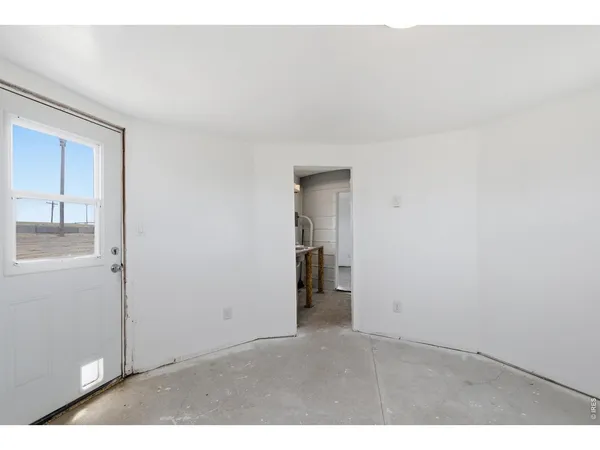 a view interior of a house and an empty room