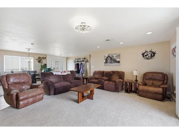 a living room with furniture and a couch