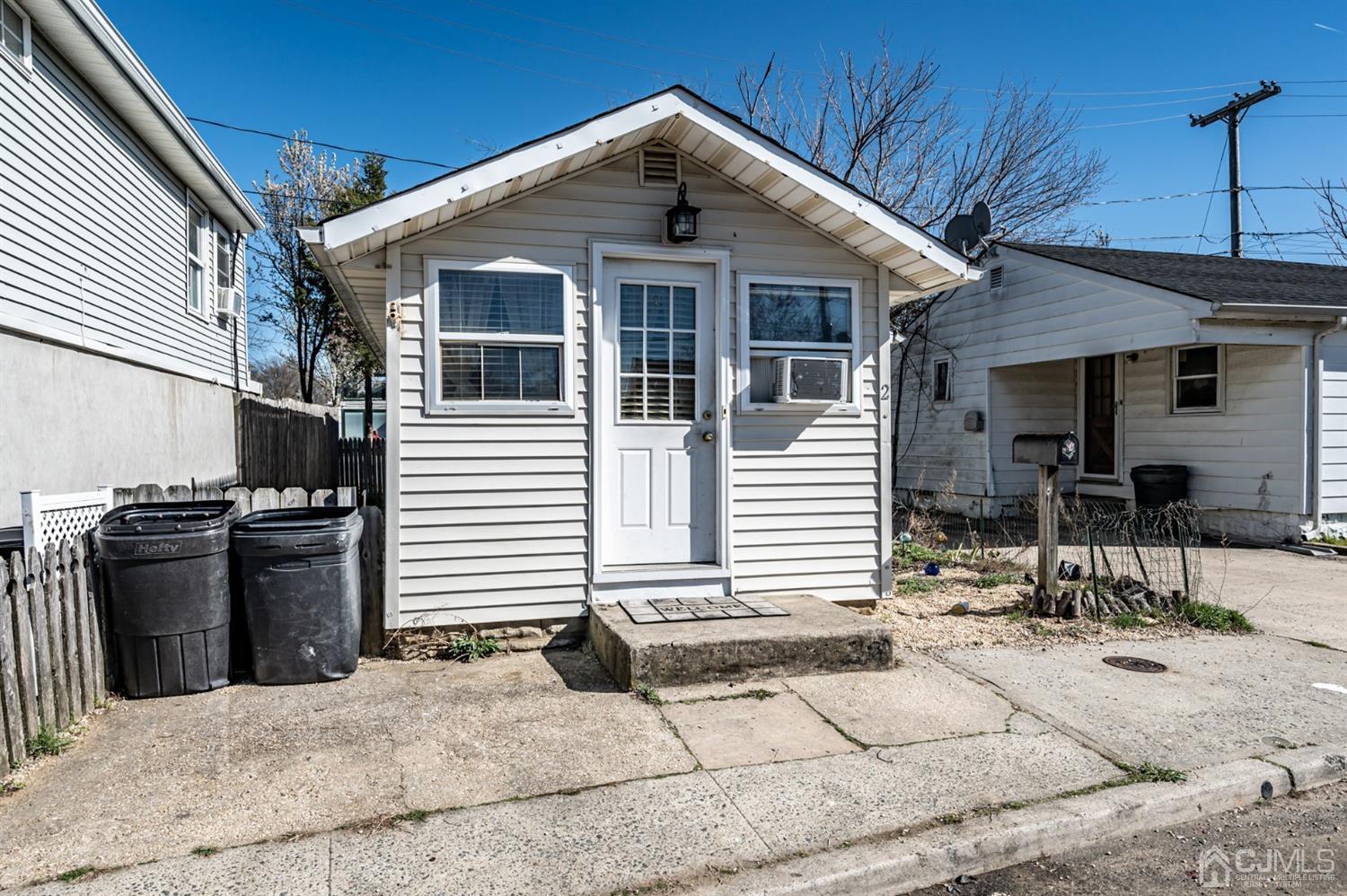 a front view of a house with yard