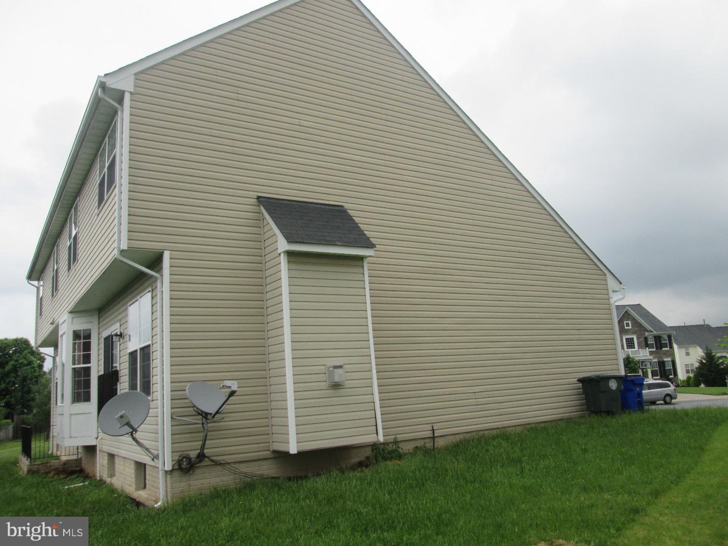 601 Crossover Court Frederick, MD 21703 - Photo 2 of 17 a view of a house with a backyard