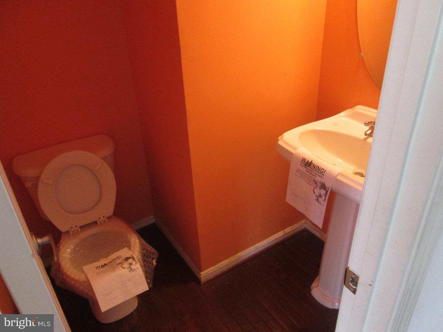 601 Crossover Court Frederick, MD 21703 - Photo 14 of 17 a bathroom with a toilet and a sink