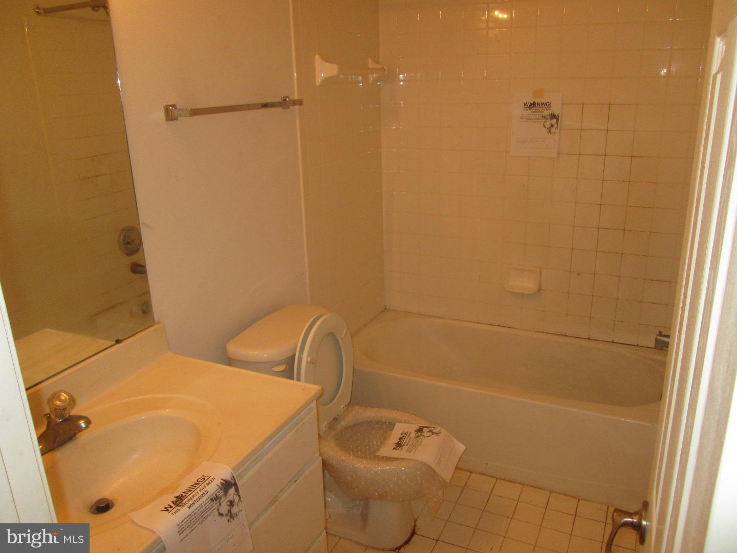 601 Crossover Court Frederick, MD 21703 - Photo 17 of 17 a bathroom with a sink and a shower