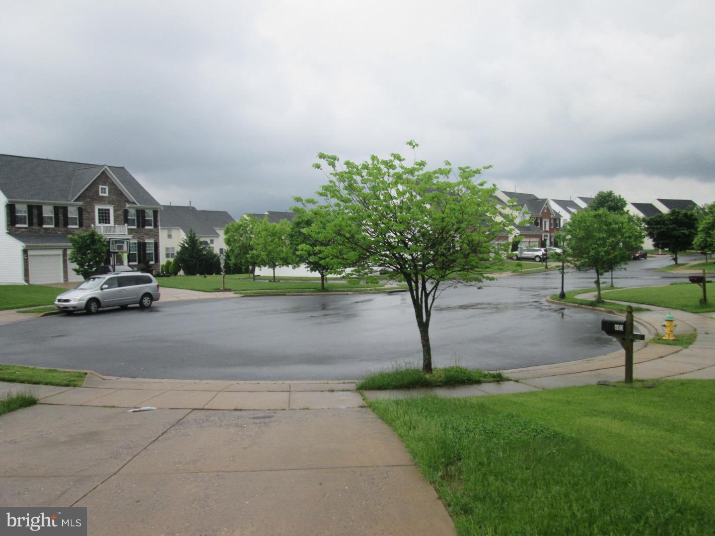 601 Crossover Court Frederick, MD 21703 - Photo 4 of 17 a view of a street with a cars parked
