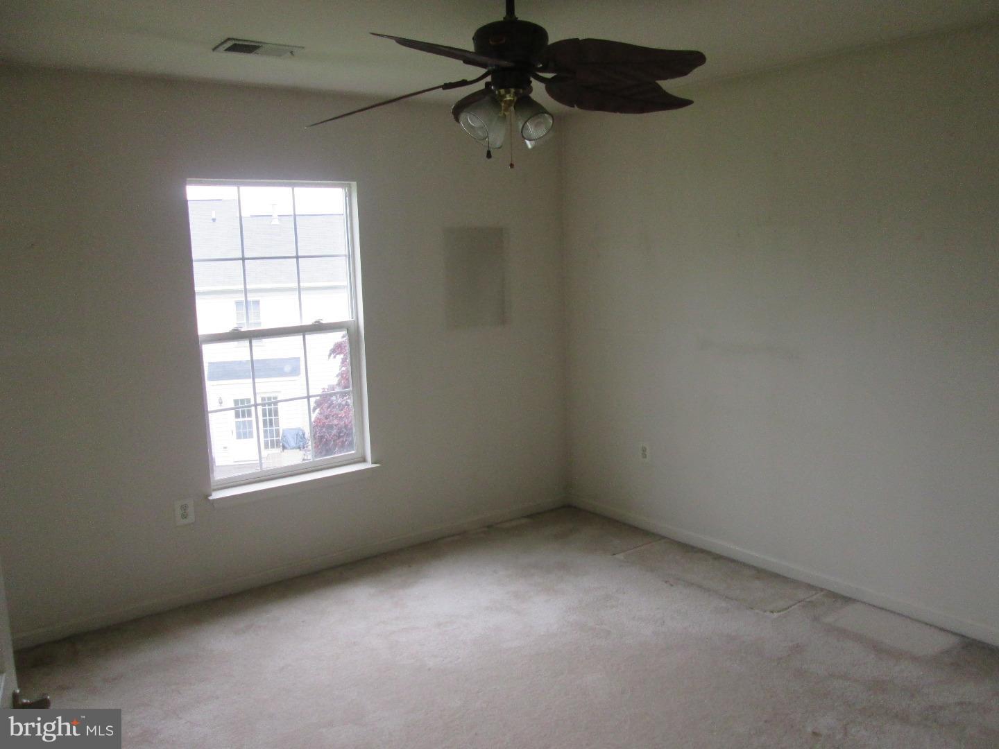 601 Crossover Court Frederick, MD 21703 - Photo 6 of 17 an empty room with a window