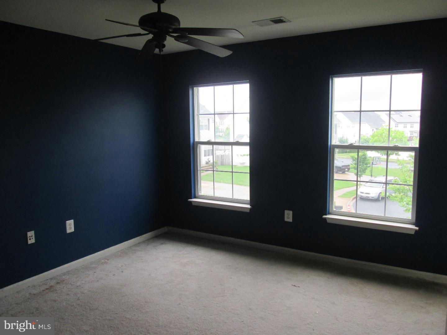 601 Crossover Court Frederick, MD 21703 - Photo 7 of 17 a view of an empty room with a window