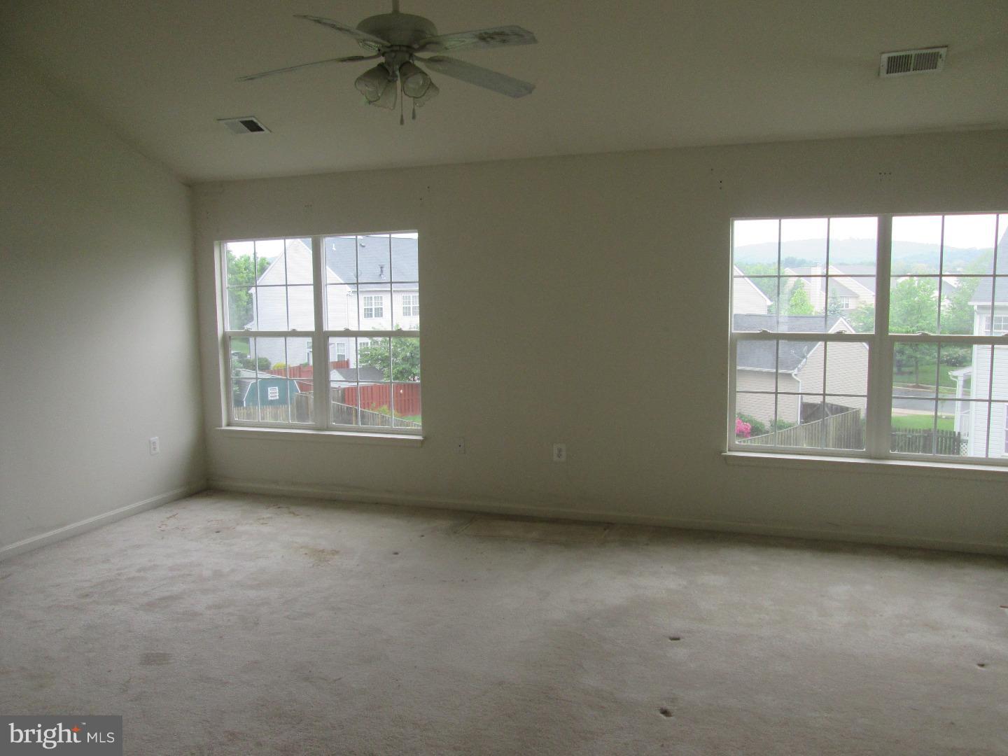 601 Crossover Court Frederick, MD 21703 - Photo 8 of 17 an empty room with a window