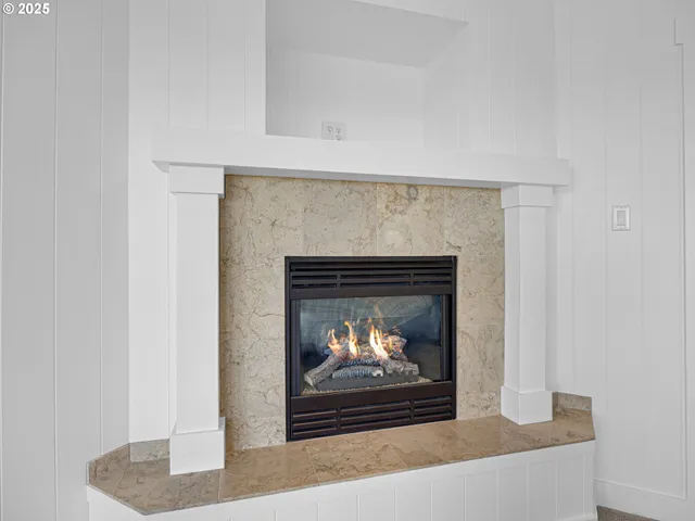 a living room with a fireplace