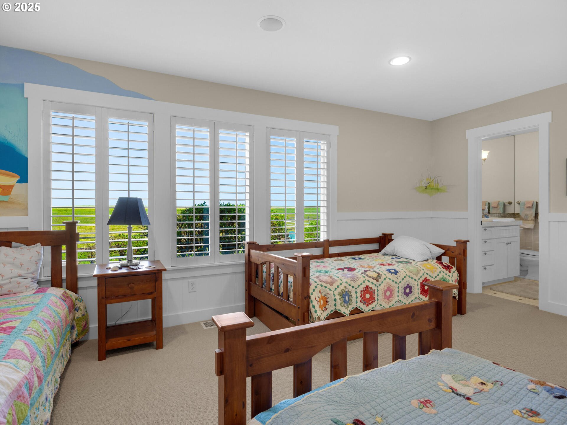 89185 Pinehurst Road Seaside, OR 97138 - Photo 34 of 48 a bedroom with furniture and a window