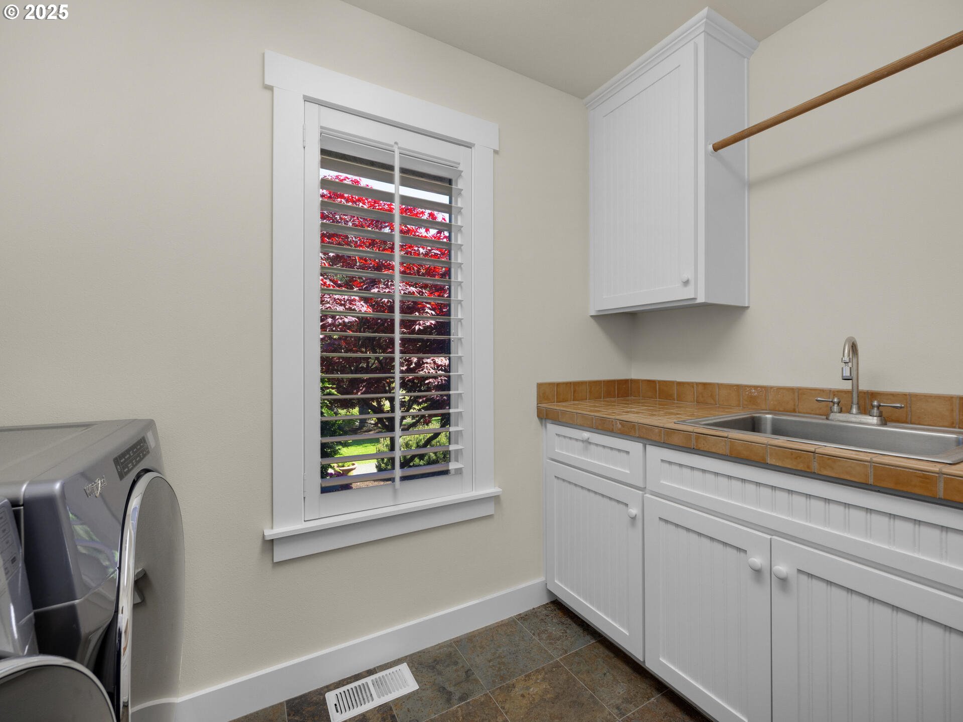 89185 Pinehurst Road Seaside, OR 97138 - Photo 37 of 48 a kitchen with a window and a sink