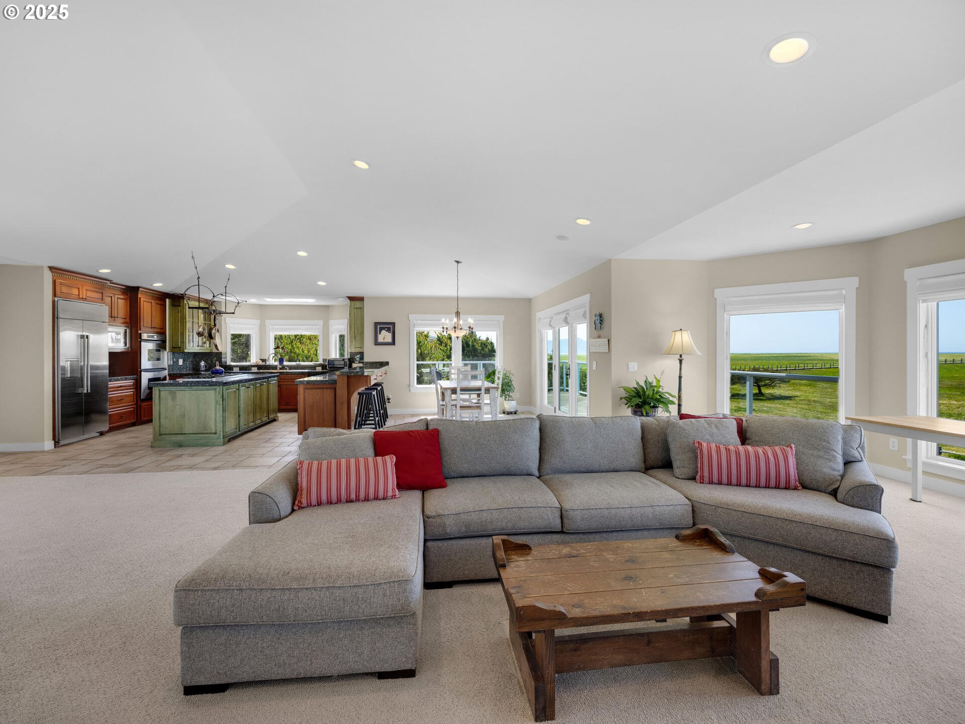 89185 Pinehurst Road Seaside, OR 97138 - Photo 6 of 48 a living room with furniture and a large window