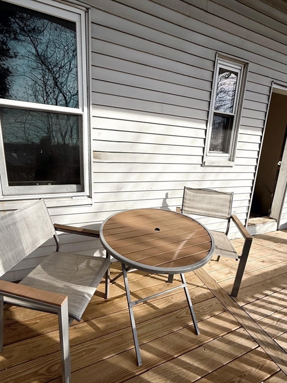 29 Mt Ida Road Boston, MA 02122 - Photo 15 of 22 a view of a house with backyard and sitting area