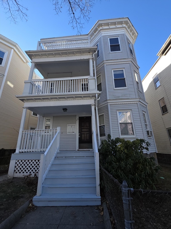 29 Mt Ida Road Boston, MA 02122 - Photo 17 of 22 a view of a house with wooden deck