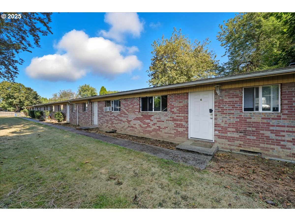 54 Northwest 13th Street Gresham, OR 97030 - Photo 5 of 20 a view of a house with a yard