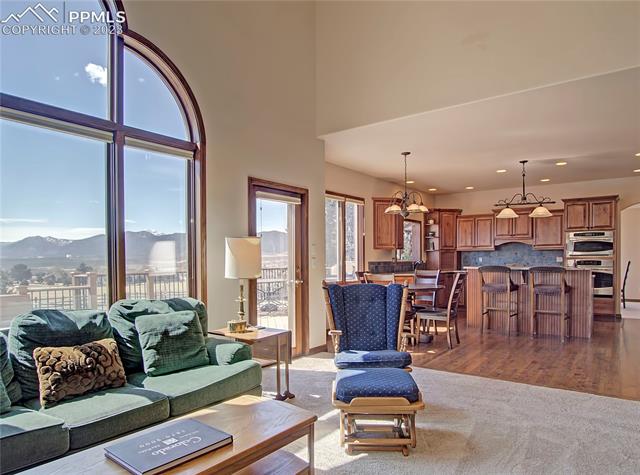 1165 Bowstring Road Monument, CO 80132 - Photo 27 of 27 View looking back to ktichen showing open floor plan for entertaining.