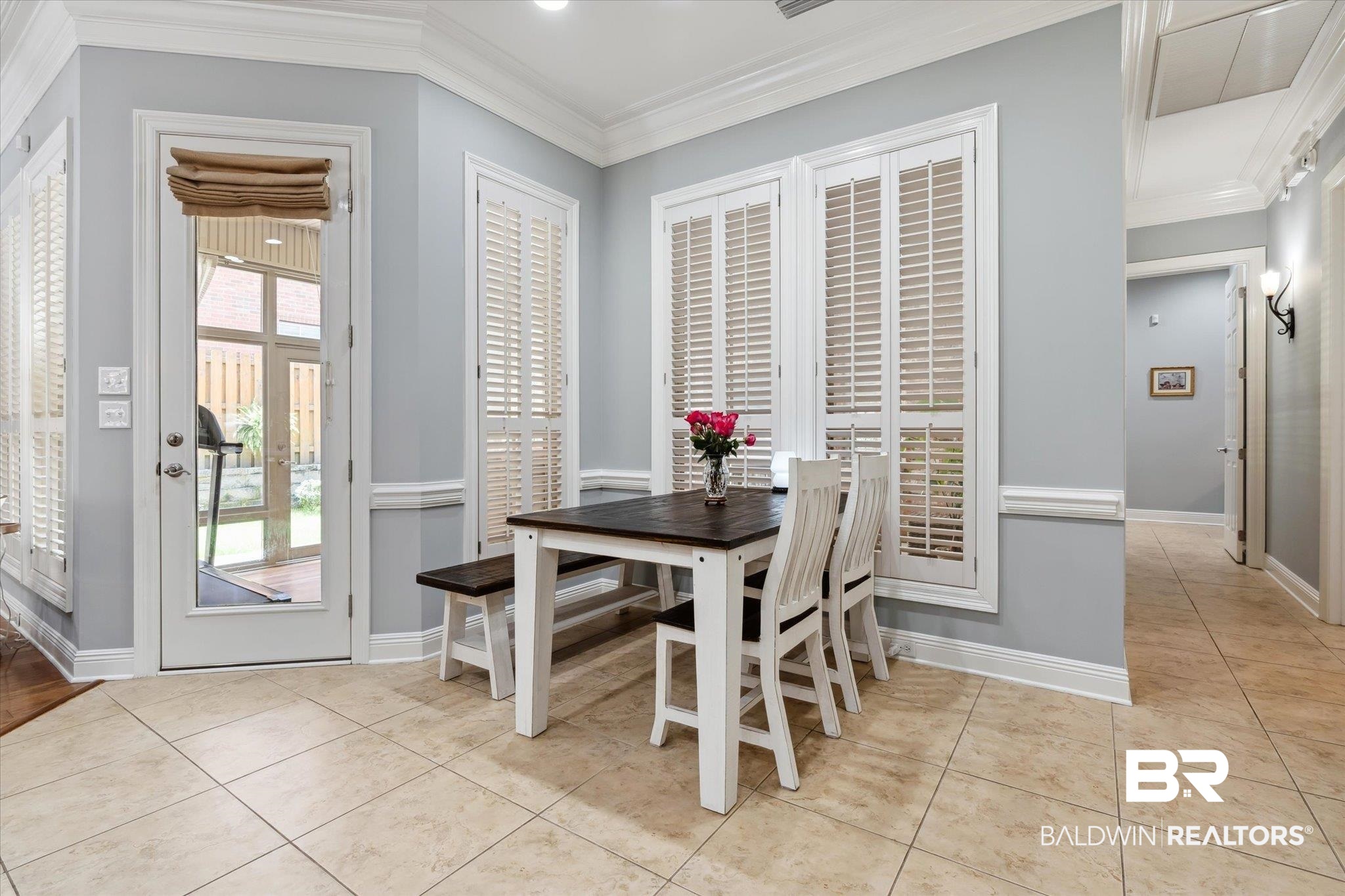 804 Country Club Road Mobile, AL 36609 - Photo 14 of 63 Dining room with a healthy amount of sunlight, crown molding, and light tile patterned floors