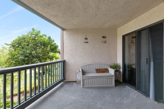 a room with furniture and stairs