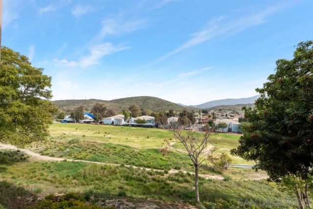 a view of lake with mountain