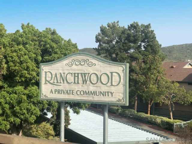 a sign on a pole on a street